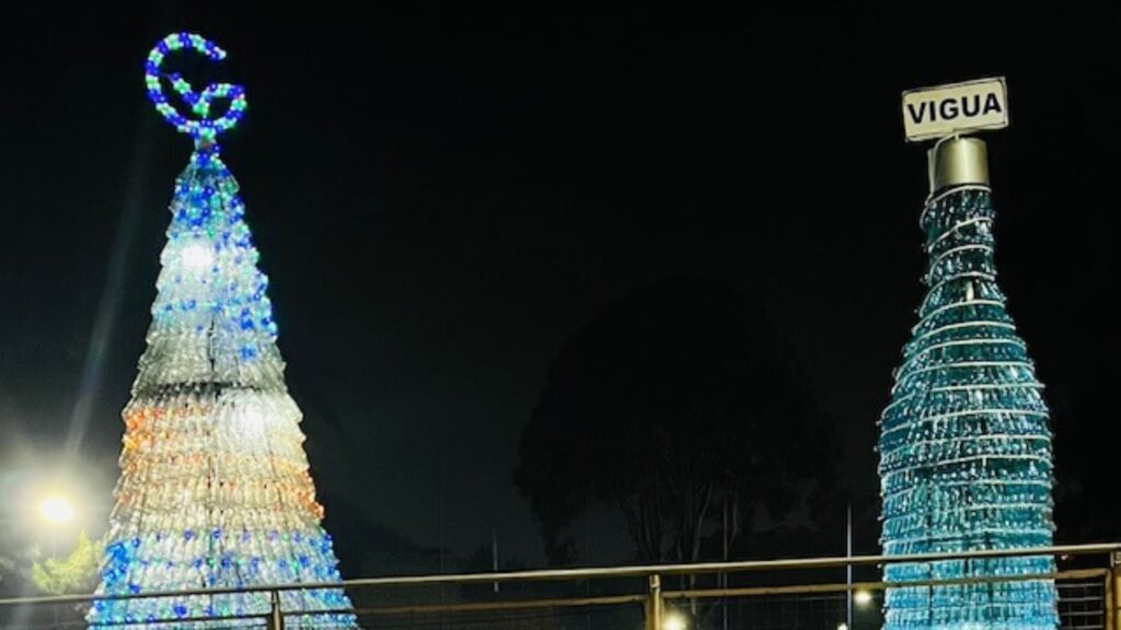Buenos deseos de Navidad, brillan en botellas de vidrio